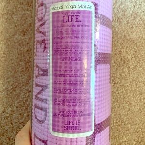 Yoga mat with carry strap